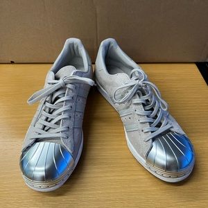Adidas Superstar US sz 7 but Superstars run large. Like New.